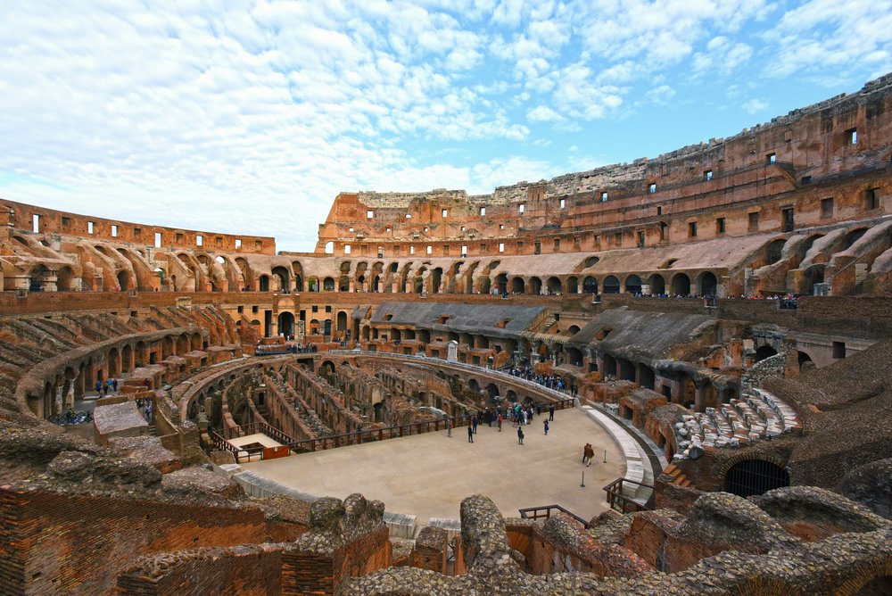 rome in october - far shot of the inside of the colosseum including arena floor