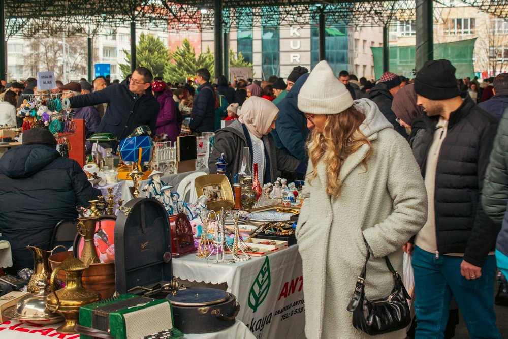 girl looking around a market