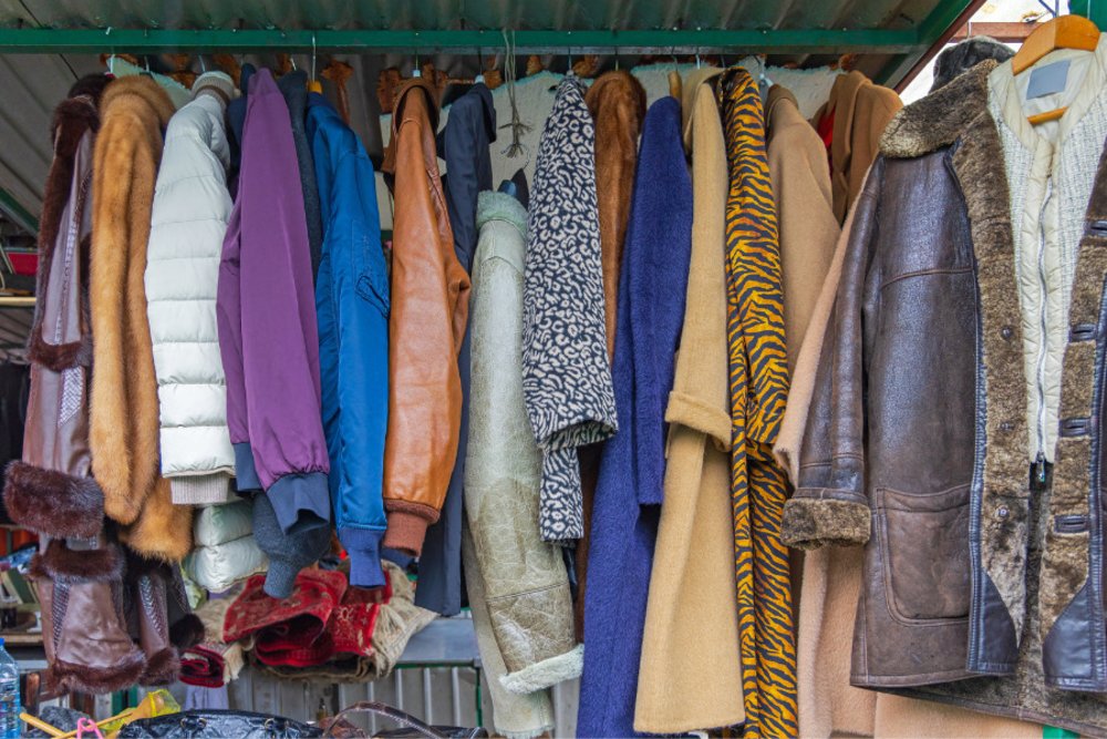 rack of vintage clothing