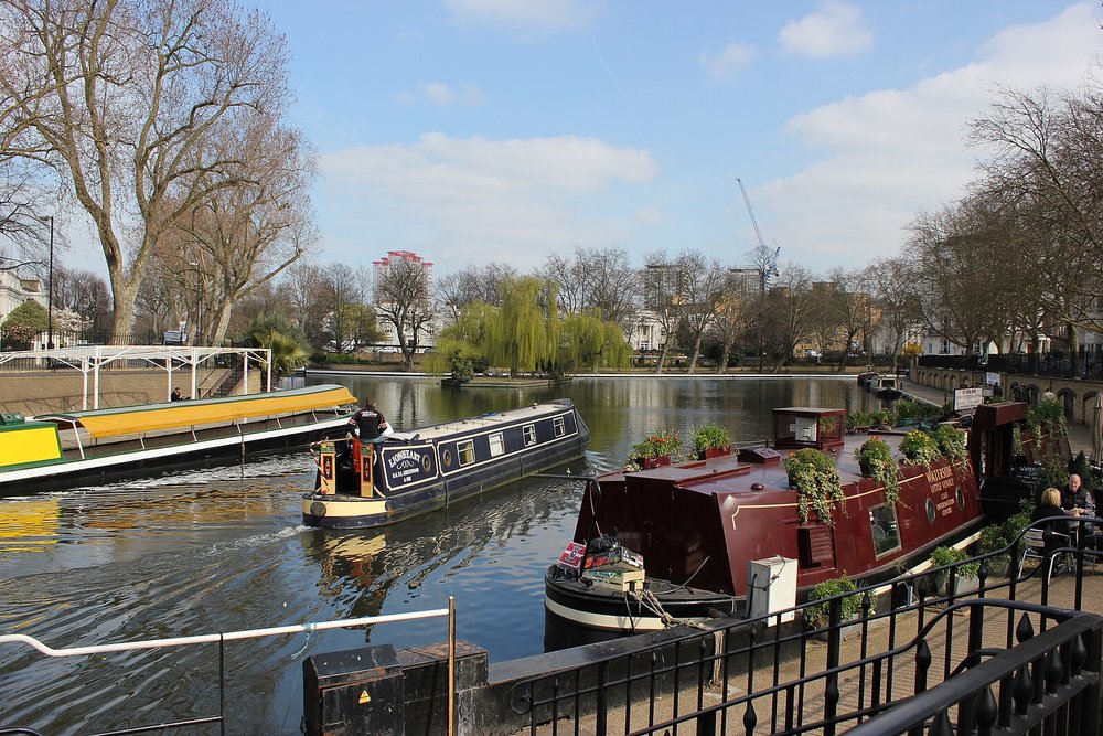 Canal boats and waterside cafes at Little Venice in London 