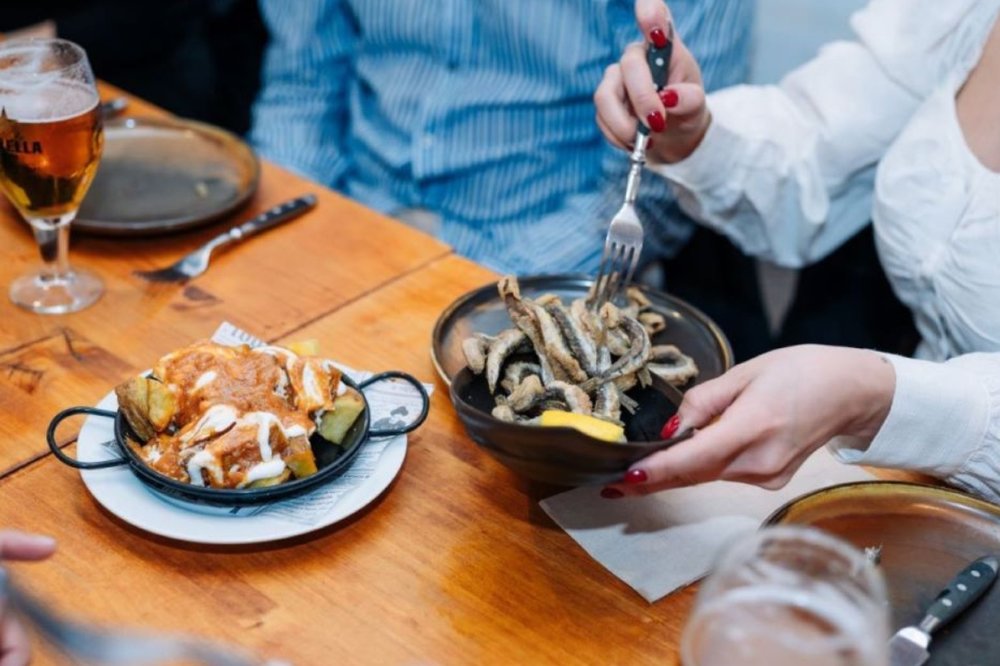 Tapas in Barcelona with patatas bravas and crispy fried fish