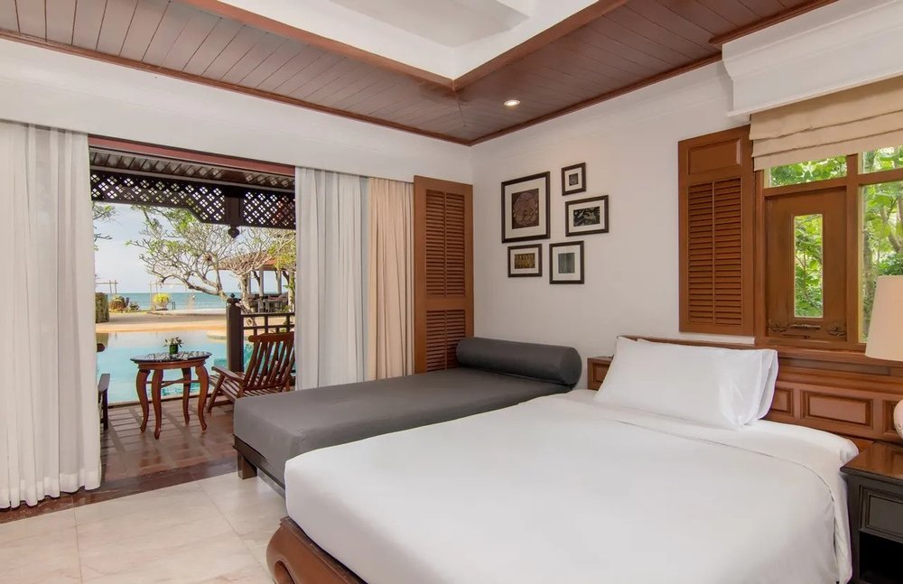 Luxury poolside villa room with ocean view at Thavorn Beach Village Resort Phuket