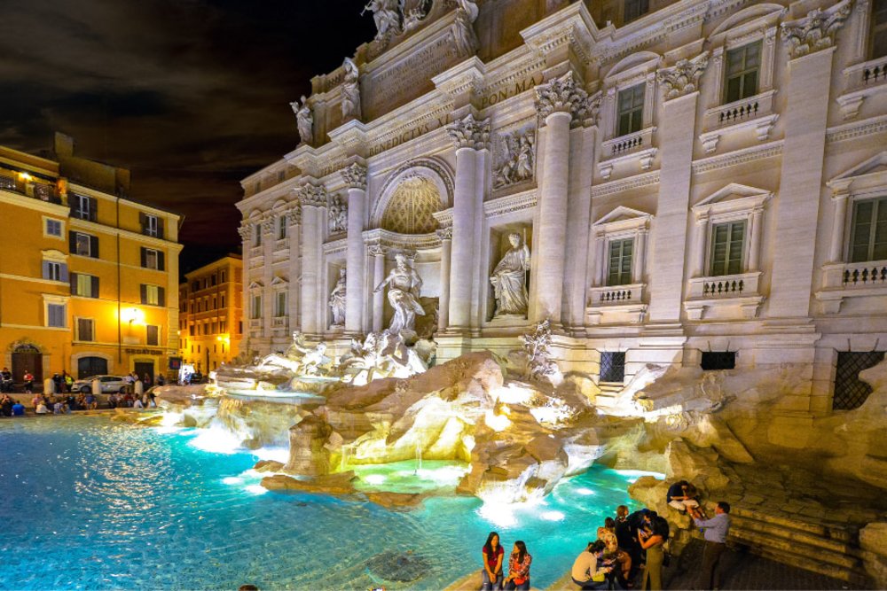 Make a wish at the Trevi Fountain 