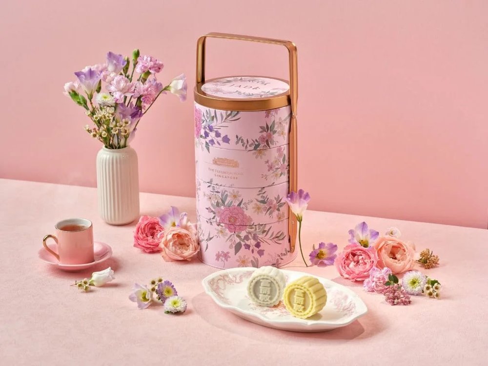 traditional pink tingkat with mooncakes