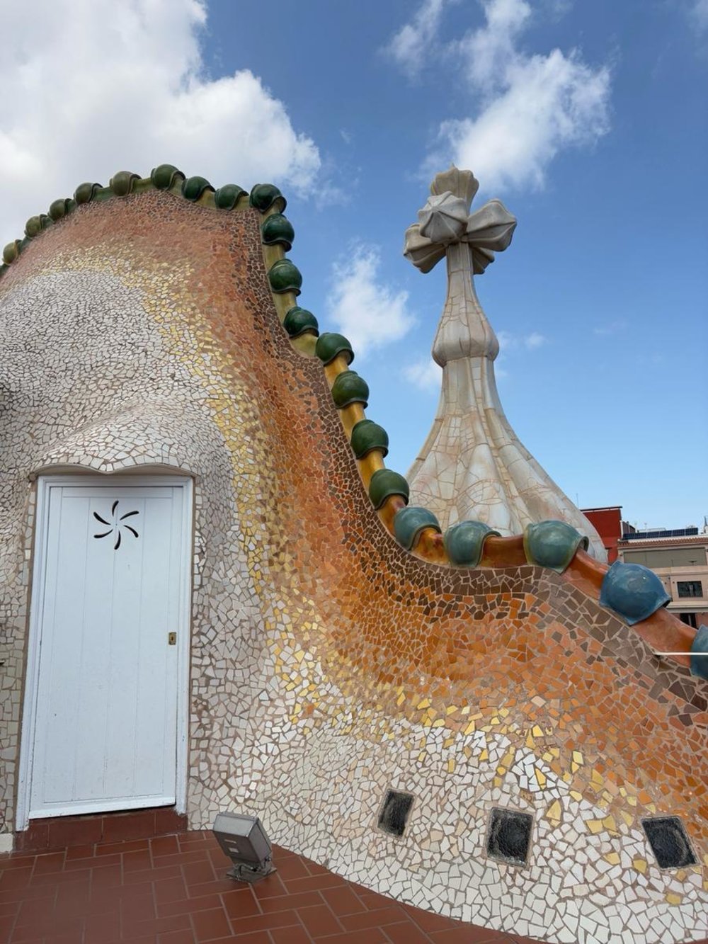 Dragon-scale rooftop and cross turret on Casa Batlló / Photo from Klook User jo *****
