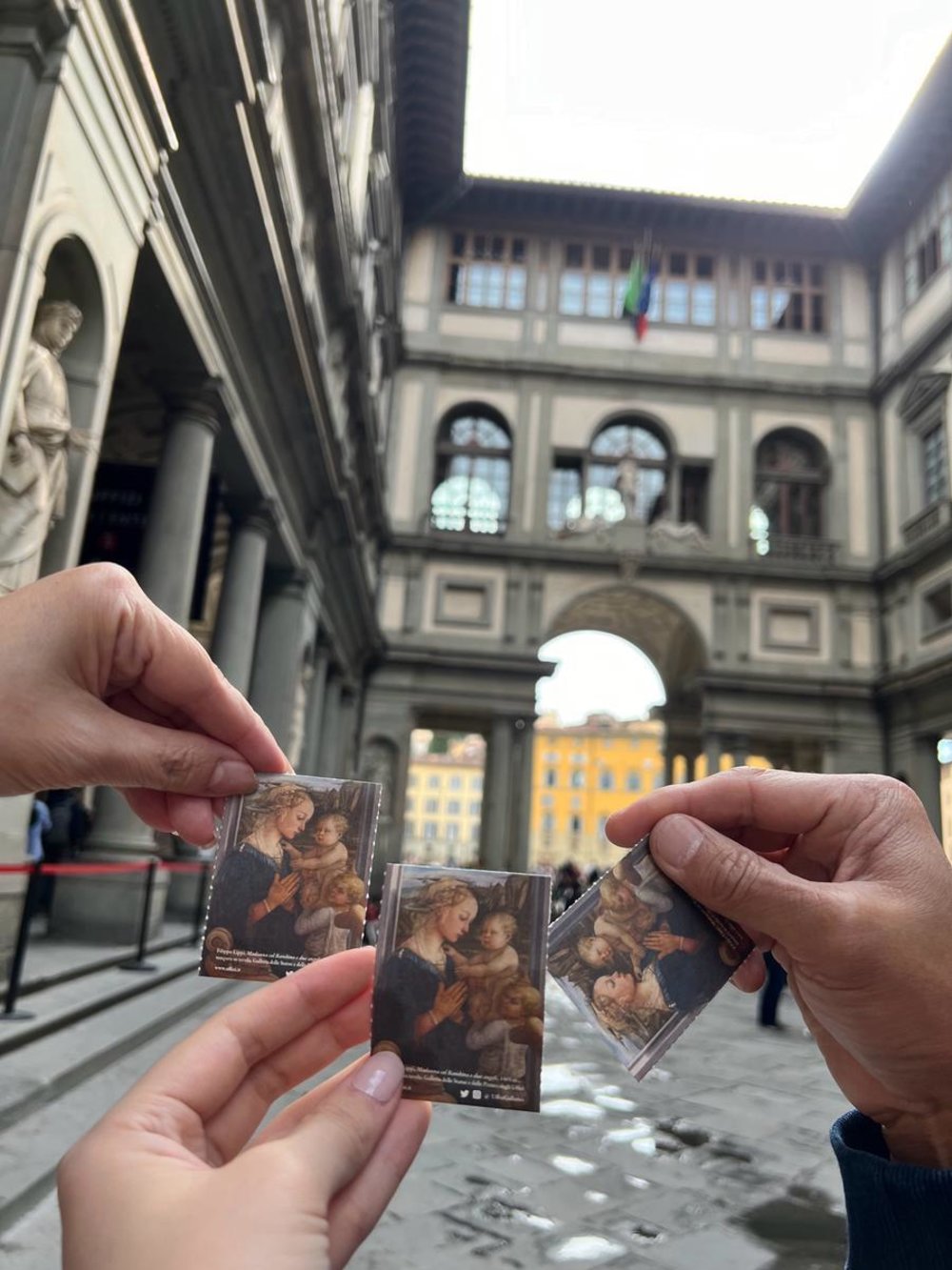 Visitors holding Uffizi Gallery tickets