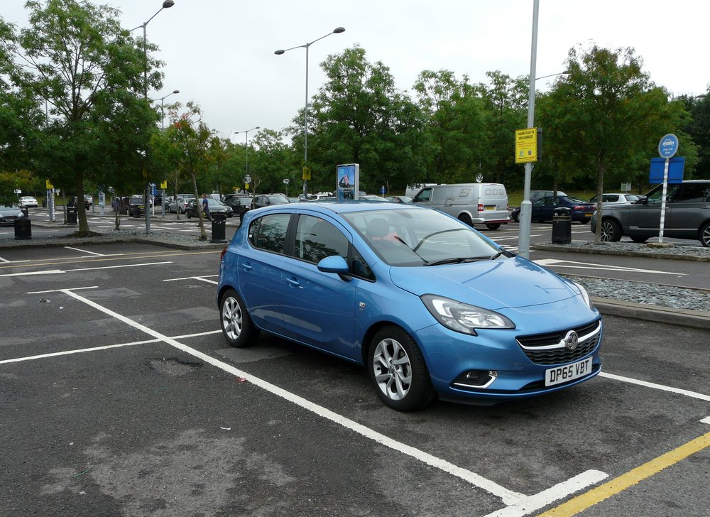 A blue rental car in England