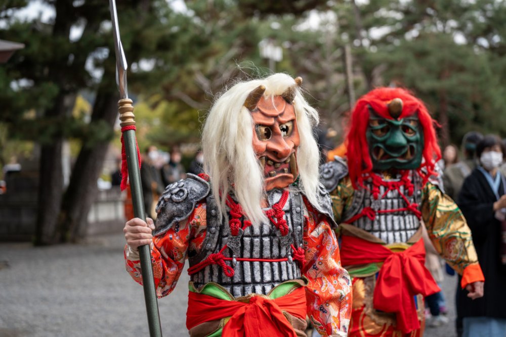 Performers wearing a oni (demon or ogre) mask during the Setsubun festival in Heian Shrine