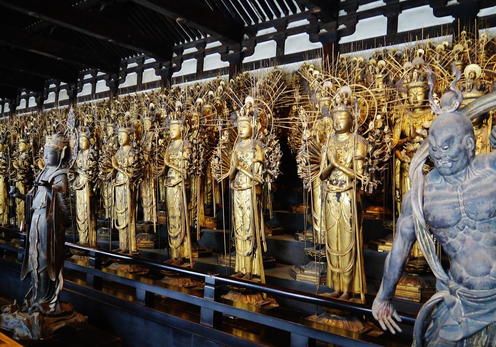 Picture of the human-sized statues inside the Sanjusangendo Temple