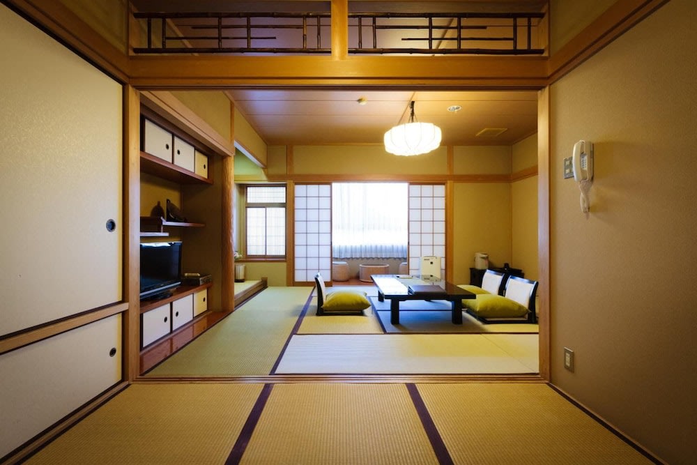 Standard Japanese Room with Futon beds in Kyoto Ryokan The KINOE