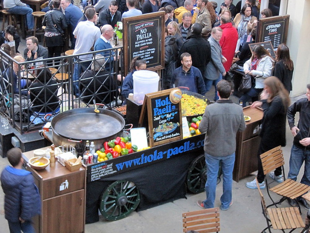 Crowds enjoying street food stalls at Covent Garden Market in London