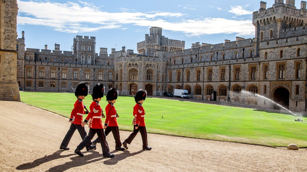 Guards walking in front of Windsor Castle