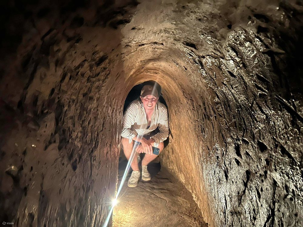 man inside cu chi tunnels