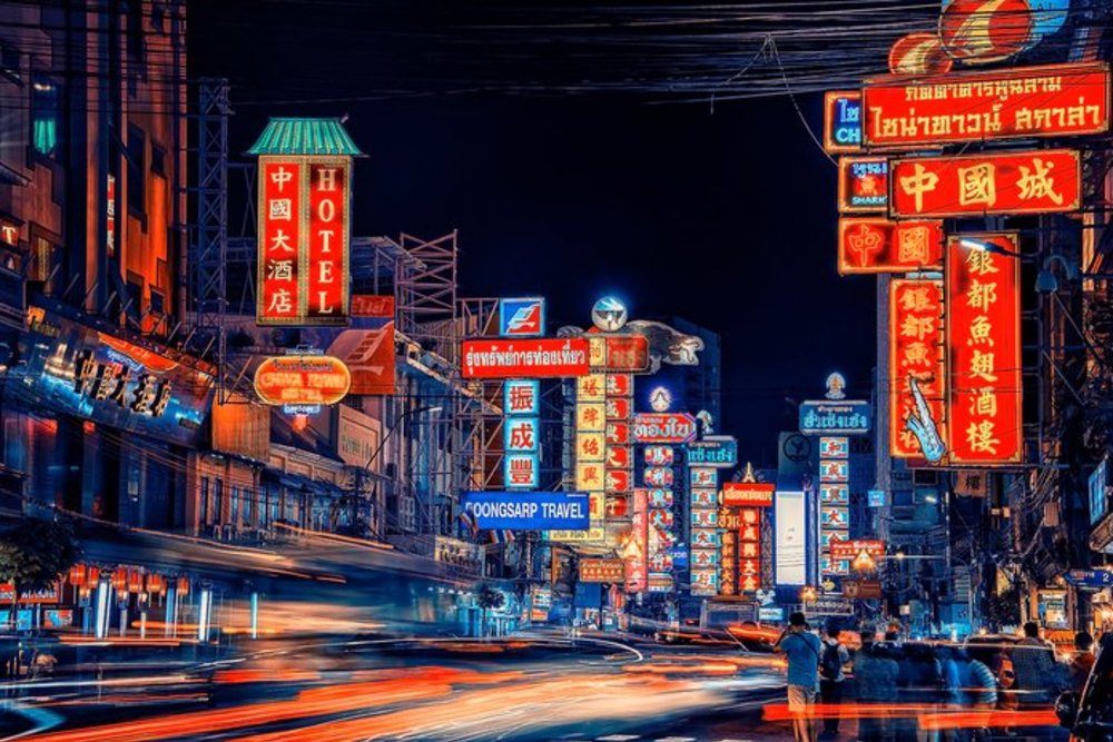 The lit-up signs on Khao San Road at night