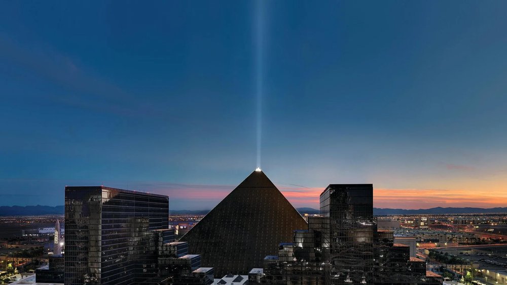 Luxor Hotel pyramid in Las Vegas with light beam at dusk