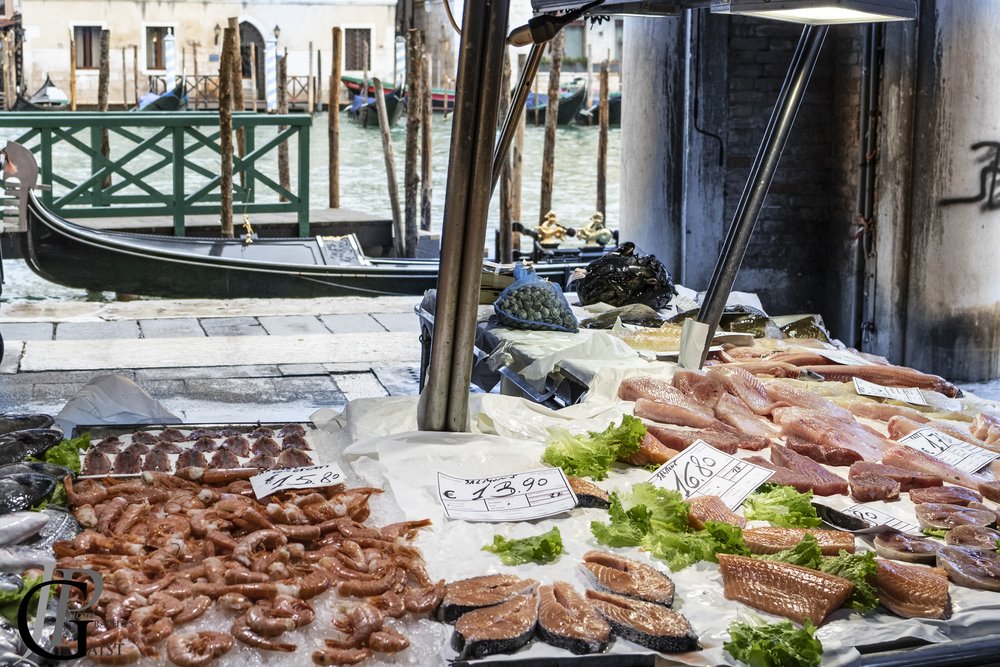 Fish and seafood stall at Rialto Market near the Grand Canal