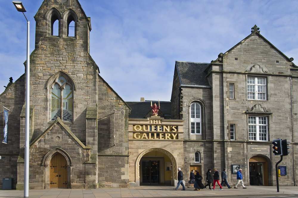 Exterior of The Queen’s Gallery with stone facade and visitors walking past