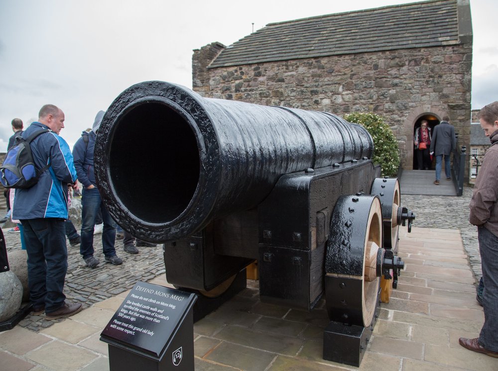 Close-up of the massive black Mons Meg cannon on display at Edinburgh Castle