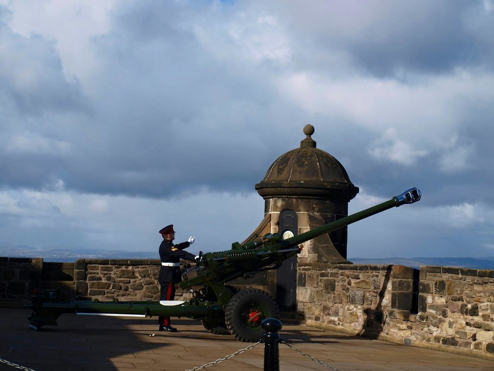 Soldier operating the One O’Clock Gun overlooking the city from Edinburgh Castle