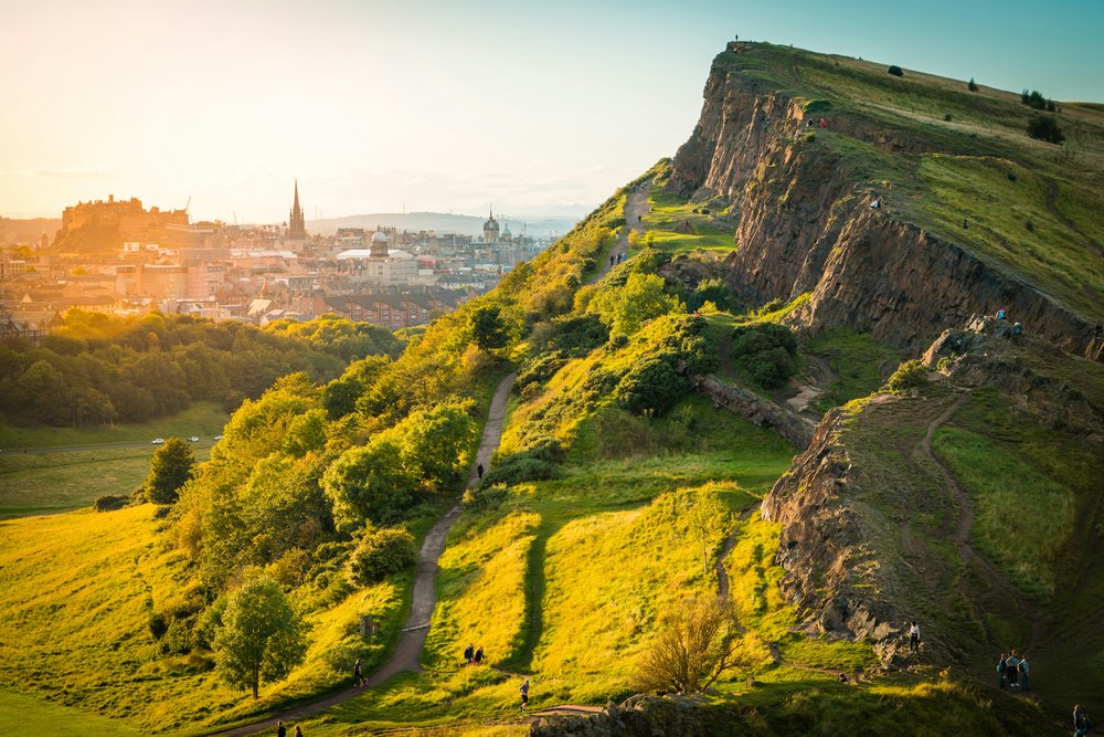 View of the summit of Arthur’s Seat with the city in the background