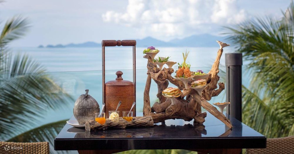 The afternoon tea selection artfully displayed on driftwood