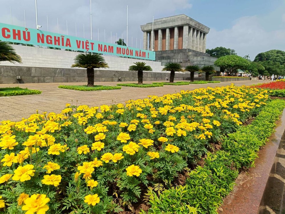 Thoughtfully placed flowers and greenery outside the mausoleum