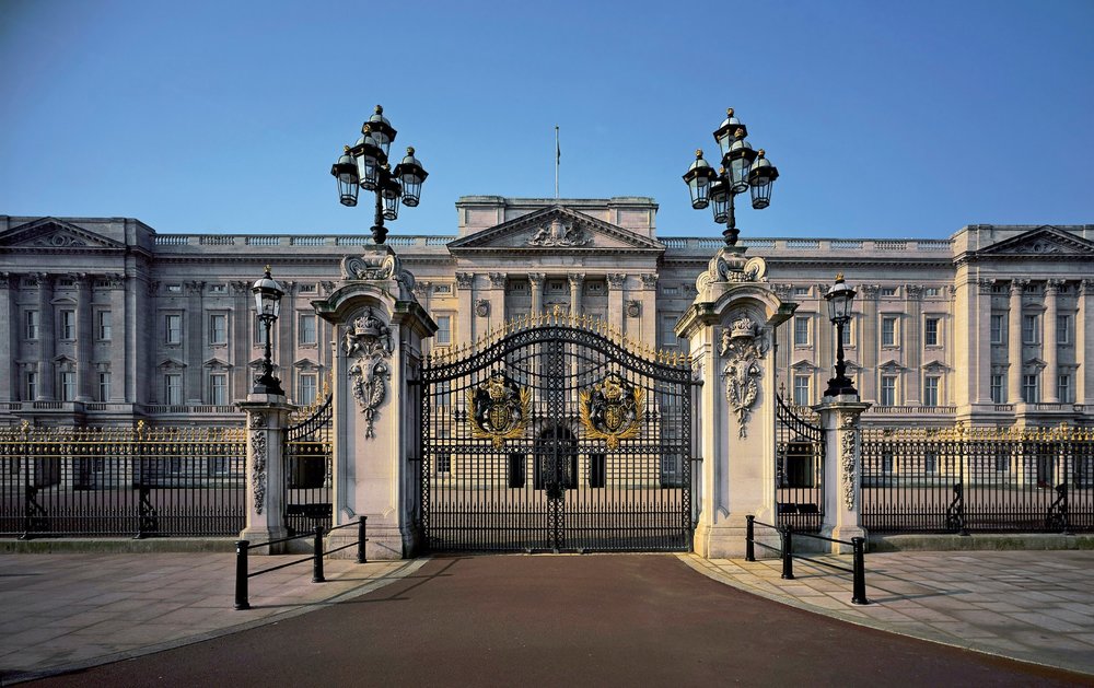 Buckingham Palace front gates and building exterior in London.