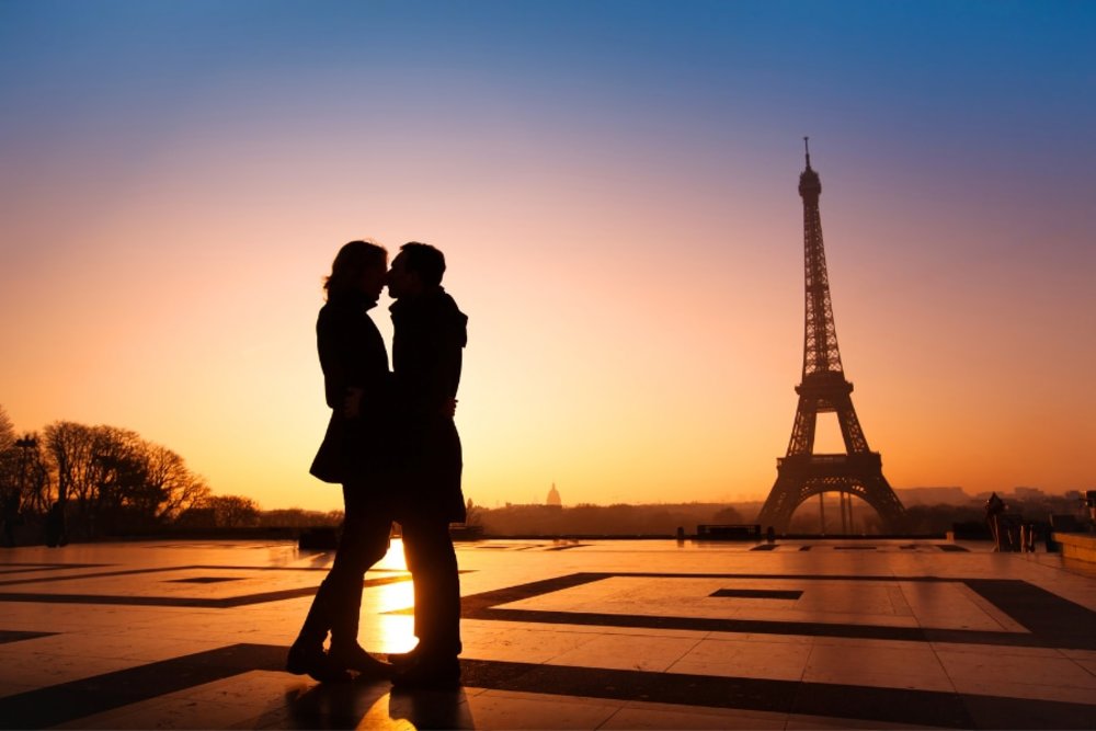 Couple in Paris with Eiffel Tower in the background 