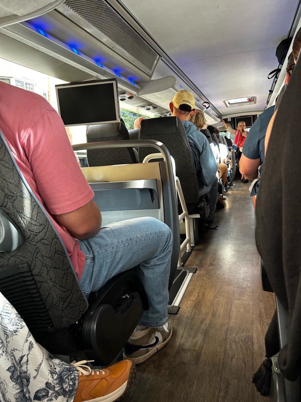 Passengers enjoying a guided day tour from London to Bath