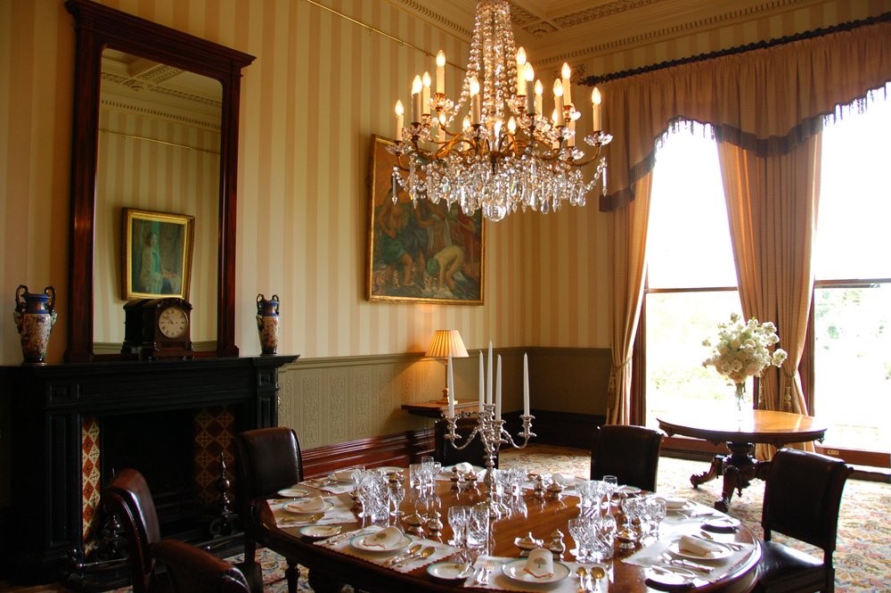 An elegant dining room with a crystal chandelier 