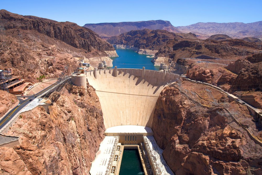 Aerial view of Hoover Dam with Lake Mead and desert mountains