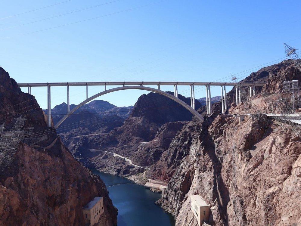 Bridge view of Hoover Dam spanning the Colorado River canyon