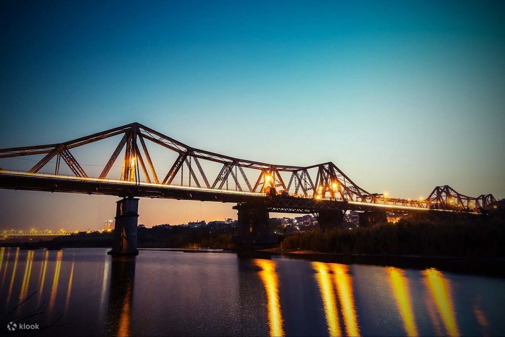 Long Lien Bridge by the Red River at dusk 