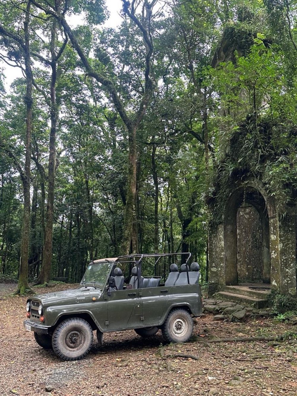 Off-road jeep parked in the forest at Ba Vi National Park near Hanoi