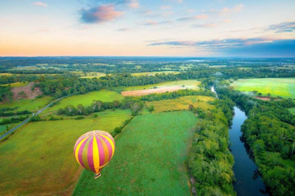 Hot air balloon over Camden Valley in Australia