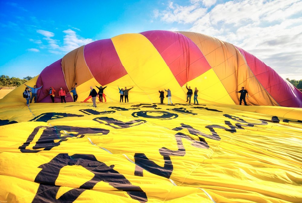 Deflating the hot air balloon post-flight