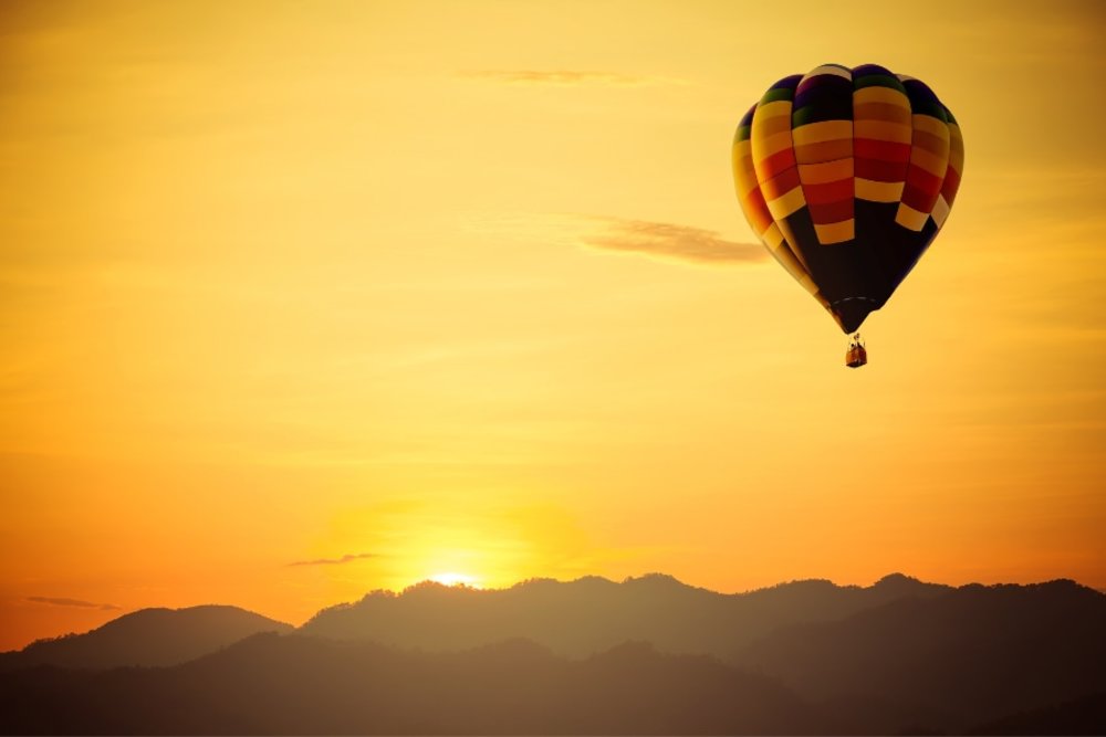 view of hot air balloon from the ground