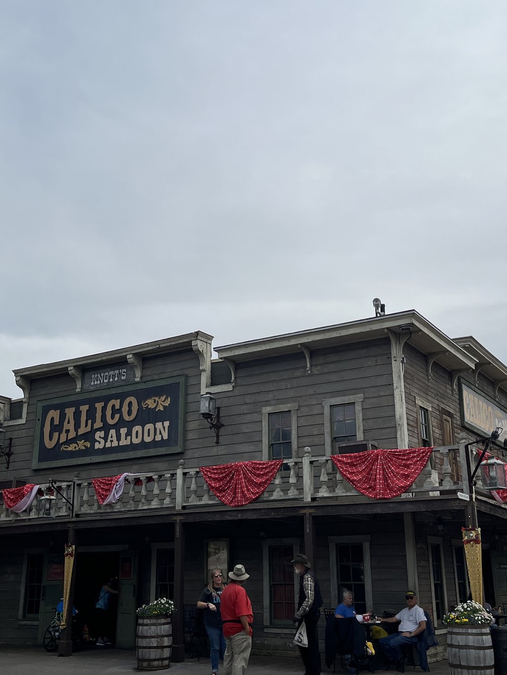 Exterior of Calico Saloon at Knott’s Berry Farm with visitors outside.