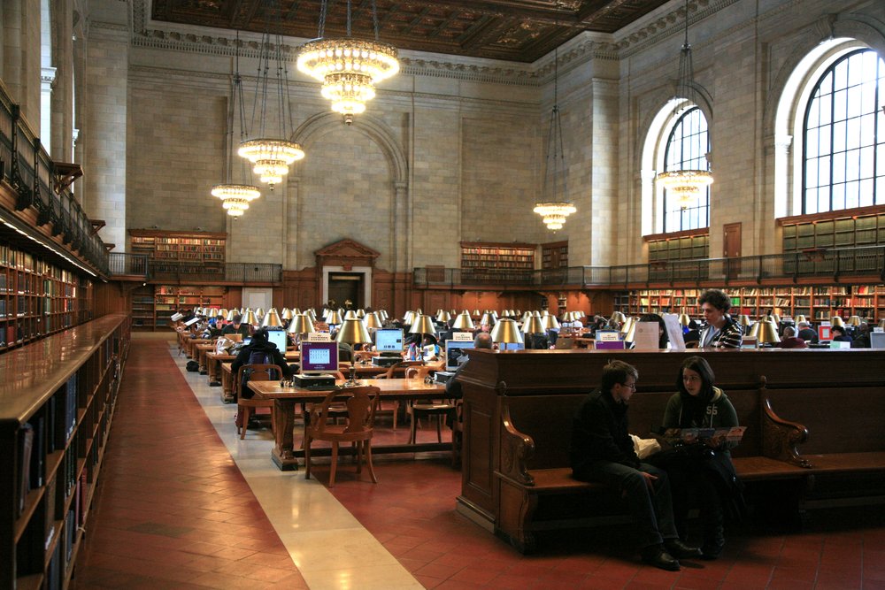 People inside the New York Public Library