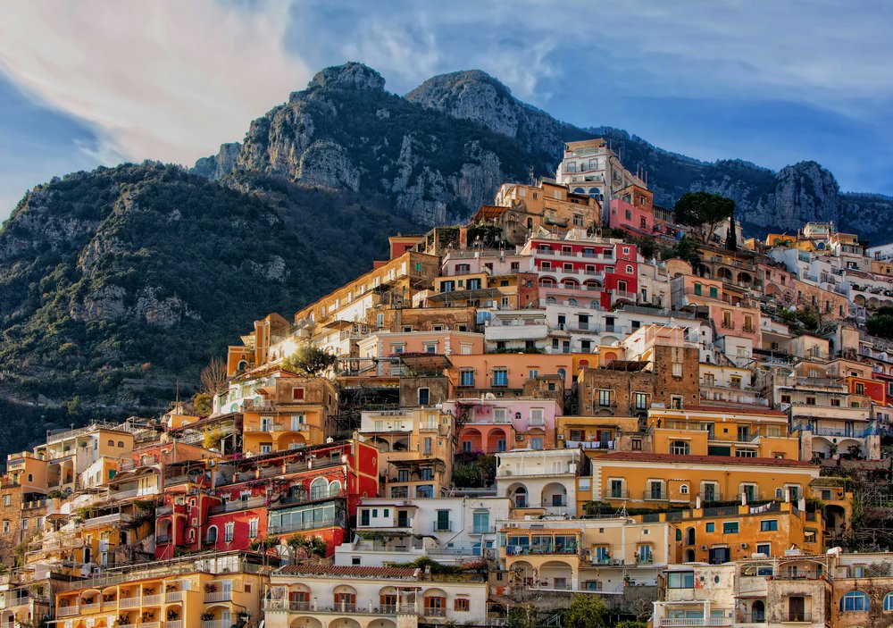 The vibrant pastel buildings of Positano from afar