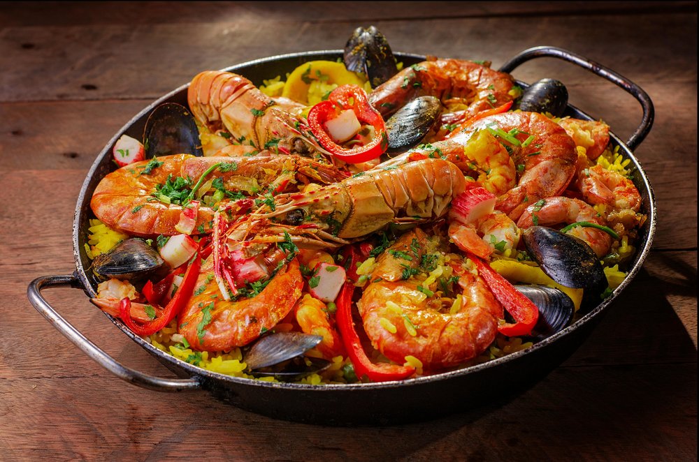 Seafood paella, made with plump shrimp and squid.