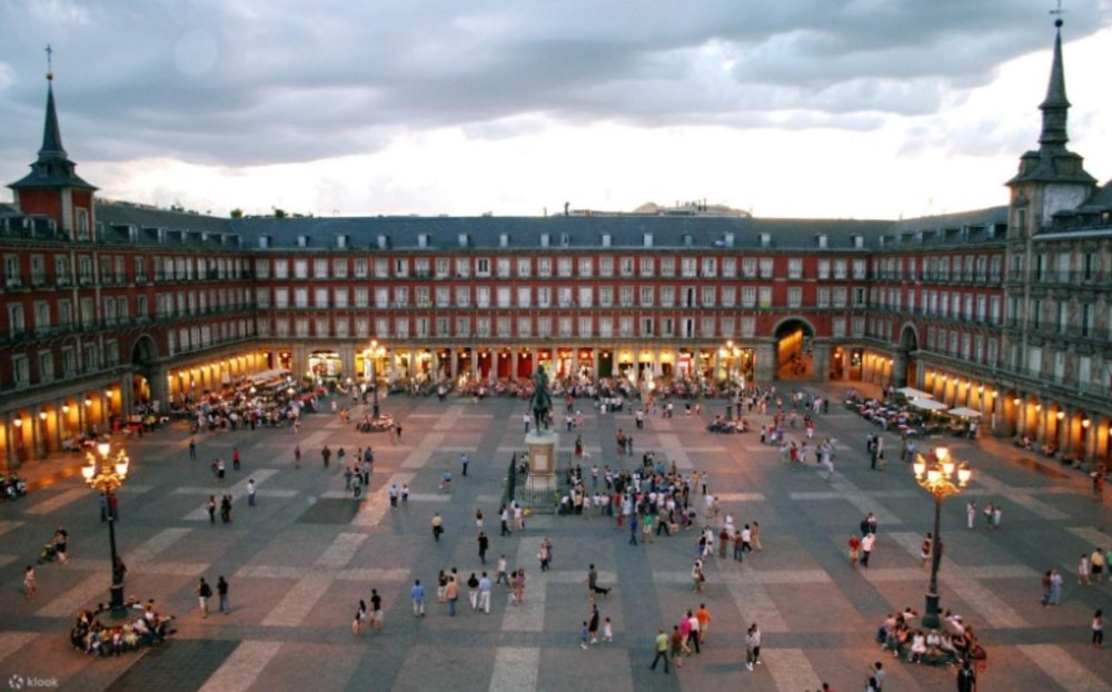 A wide view of Plaza Mayor in Madrid at dusk