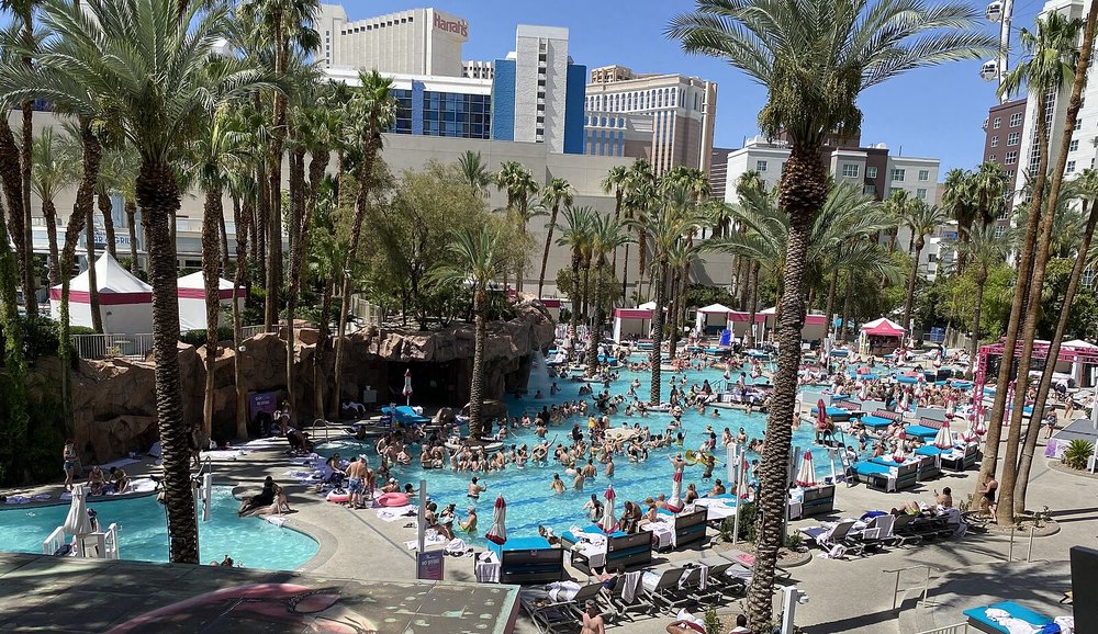 People enjoying a lively pool party at a Las Vegas resort in March