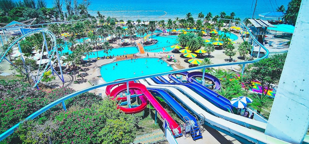 An aerial shot showing the slides, pools, and rollercoaster at Pattaya Park Beach Resort.