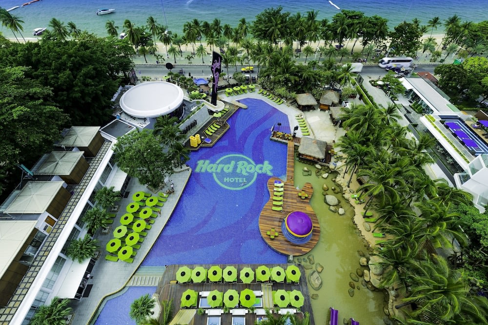 An aerial shot of Hard Rock Hotel’s swimming pool and guitar-shaped pool patio.