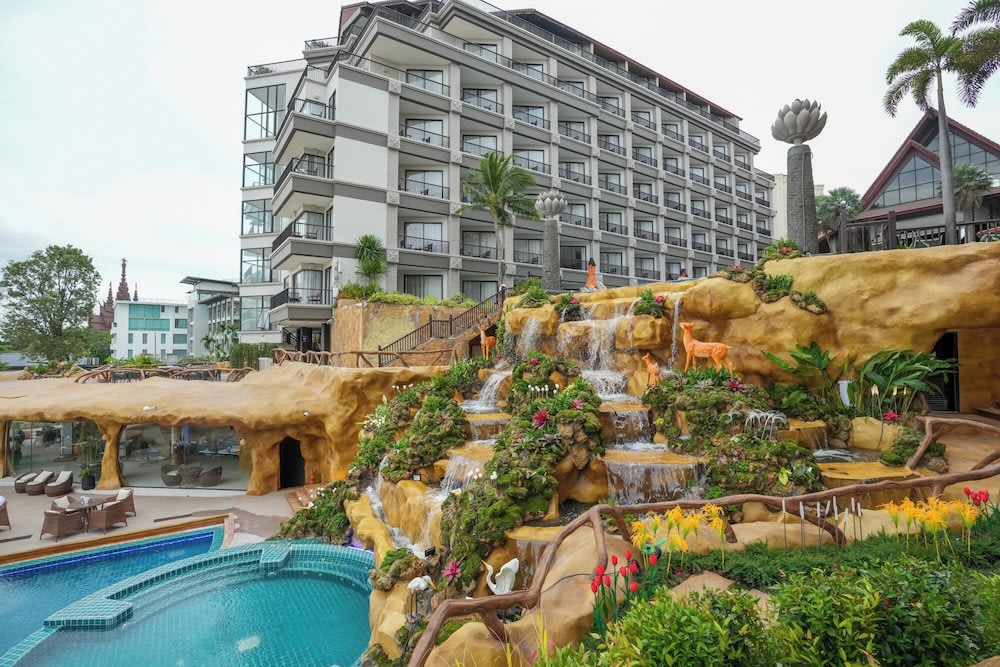 A side shot of the waterfalls beside the resort’s swimming pool.