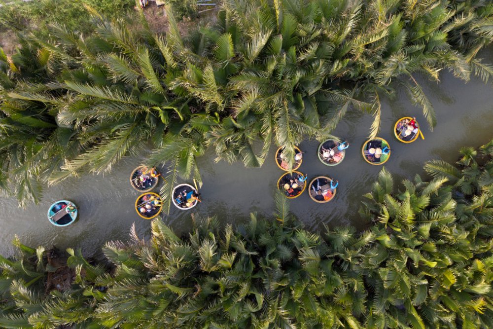 People on basket boats in Cam Tanh Coconut Village