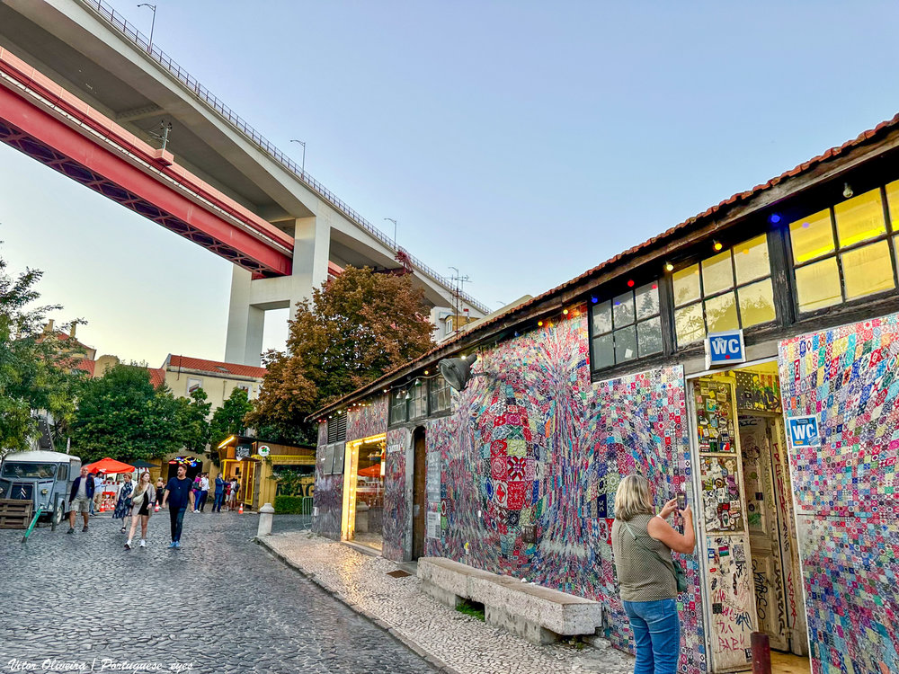 People strolling around LX Factory