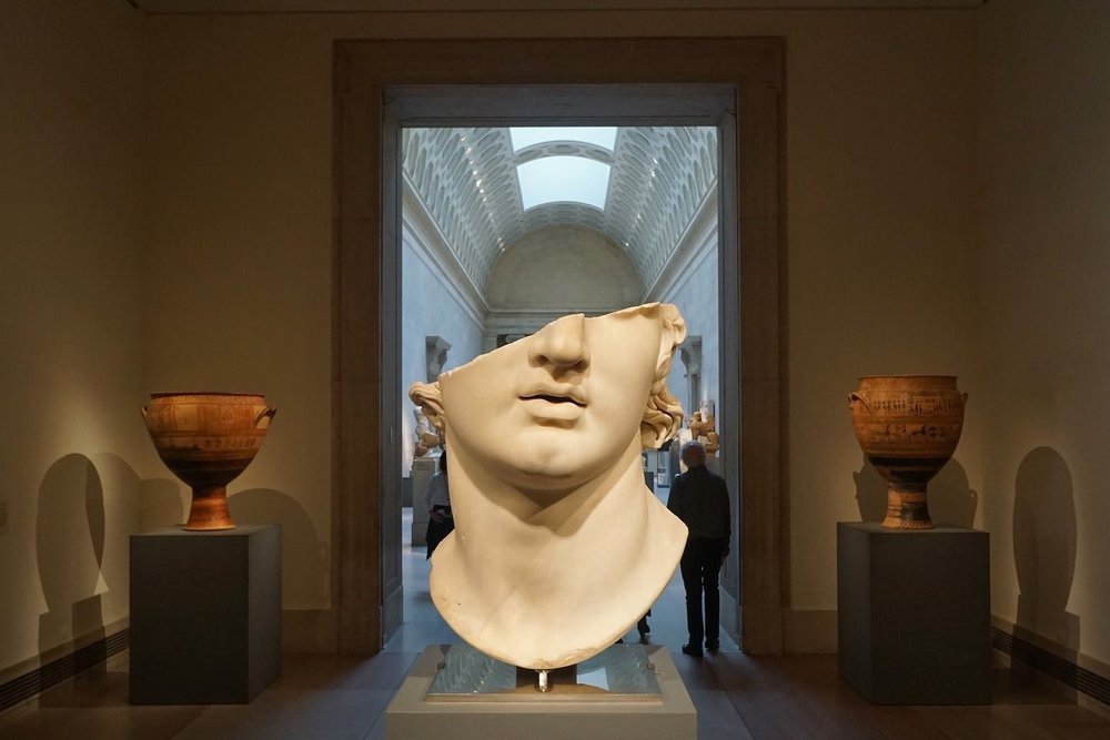 marble head of a youth sculpture at the nyc met museum metropolitain museum of art