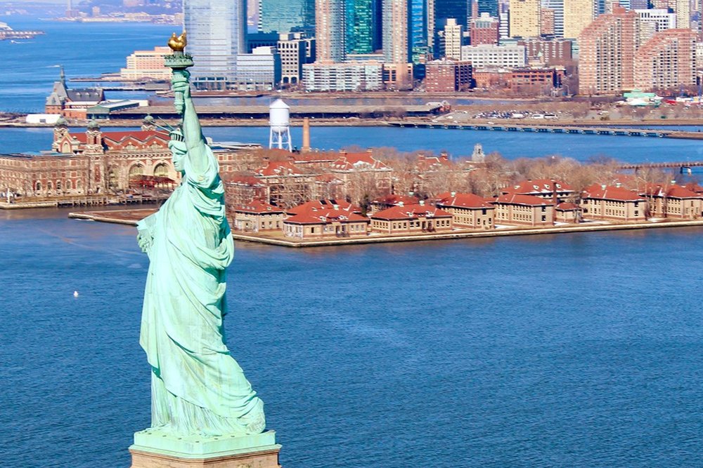The views of Statue of Liberty and New York from Ellis Island